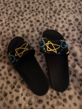 Gucci Black Slides with Yellow and Blue Graphic Strap